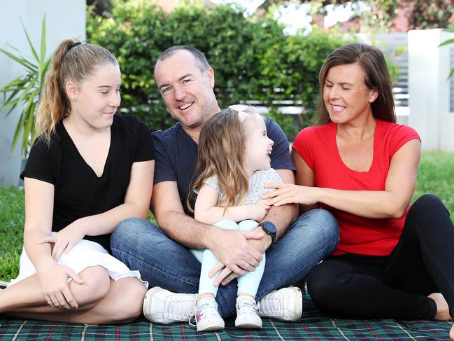 Colin Winn with partner Karen Clark and children Chiara, 13 and Juliet, 3. Colin is at greater risk of COVID-19. Picture: Tim Hunter.