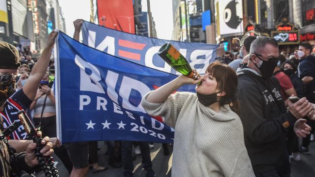 People celebrate in the streets of New York after it was announced that Joe Biden would be the next U.S. PresidentPicture: Stephanie Keith/Getty/AFP