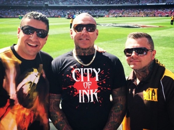 Kazem Hamad (left) at the footy with Toby Mitchell and senior Mongol bikie Tyrone Bell. Picture: Instagram