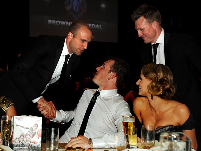 Brownlow Medal winner Dane Swan is congratulated by Chris Judd. Picture: Michael Dodge