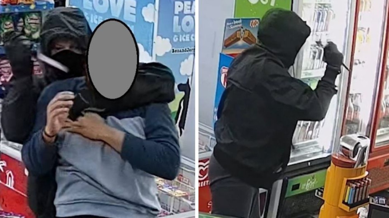 Terrifying moment worker held at knifepoint