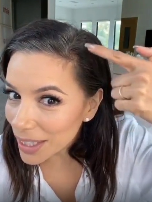 Eva Longoria pointing to her the grey roots in her hair during lockdown last year. Picture: Instagram