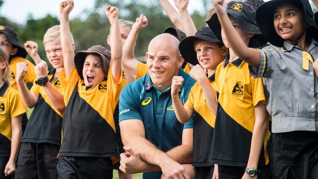 Stephen Moore with kids from Coorparoo State School in Brisbane. Picture: Stuart Walmsley