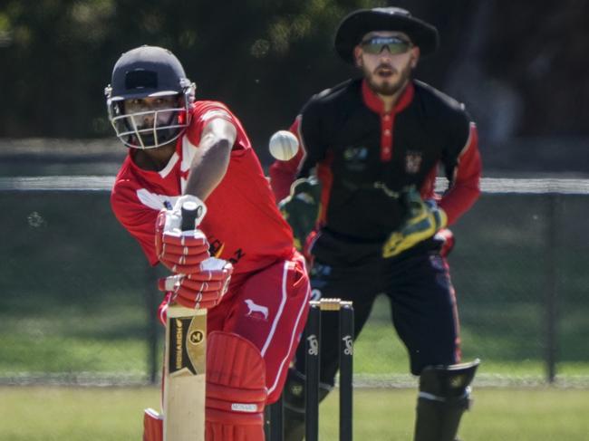 Mordialloc batter Chamindu Mathra and South Caulfield keeper Elliott Bradley. Picture: Valeriu Campan