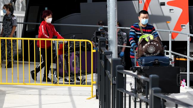 Passengers arriving off international flights board buses to quarantine hotels in Sydney. Picture: Bianca De Marchi