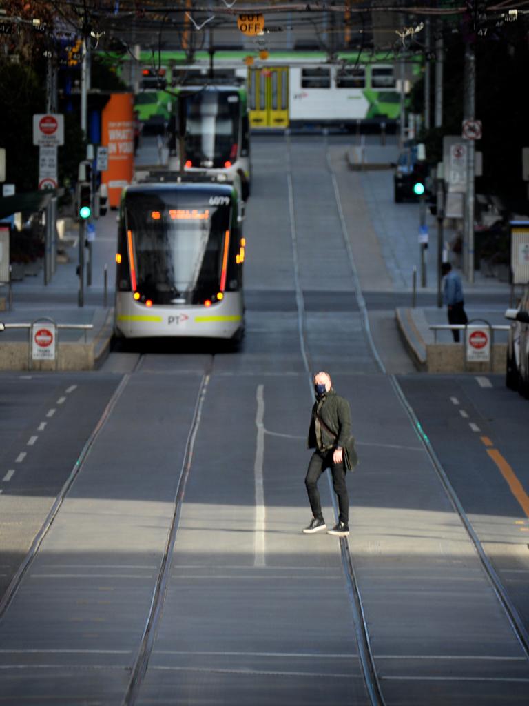 Melbourne's streets are significantly quieter after the introduction of stage four restrictions. Picture: Andrew Henshaw/NCA NewsWire.
