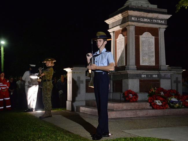 Airforce Cadet CFSGT Douglas Pridmore stands guard at the cenotaph at Jubilee Park for a Dawn Service in Mackay.