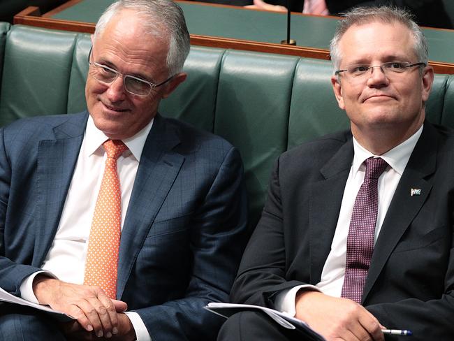 Prime Minister Malcolm Turnbull and Treasurer Scott Morrison appear unimpressed with the Opposition Leader’s Budget reply speech. Picture: Stefan Postles/Getty Images.