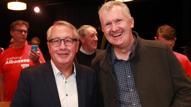 Wayne Swan and Tony Burke are all smiles at the election night party. Picture: John Feder