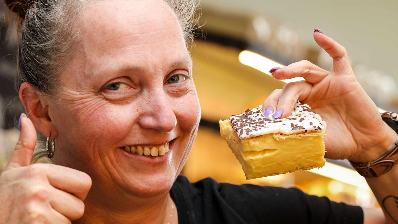 Bake Bakery manager Cass Barlow with a vanilla slice. Picture: Russell Millard