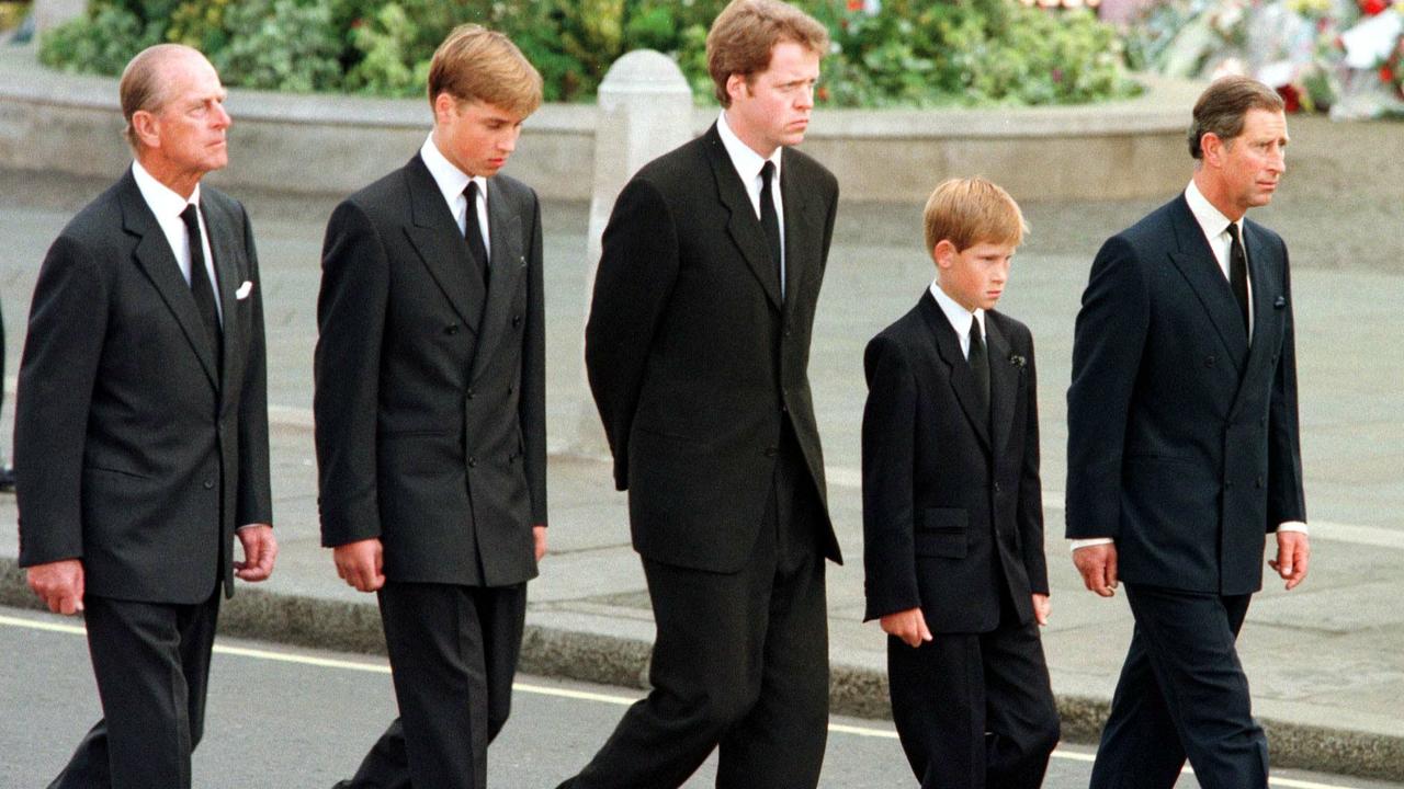 Britain's Prince Philip, Duke of Edinburgh, Prince William, Earl Spencer, Prince Harry and Britain's Prince Charles, Prince of Wales walk outside Westminster Abbey during the funeral service for Diana in 1997. Picture: AFP