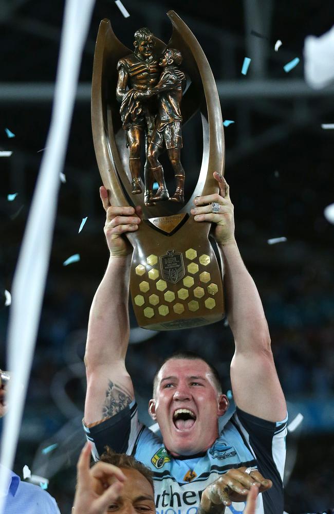 Cronulla captain Paul Gallen hoists the NRL Premiership trophy after the Sharks’ grand final win last season.