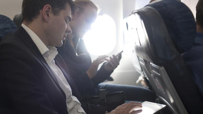Travellers addicted to devices will have to get used to the feel of paper once again if flying to the US out of the Middle East. Picture: Supplied