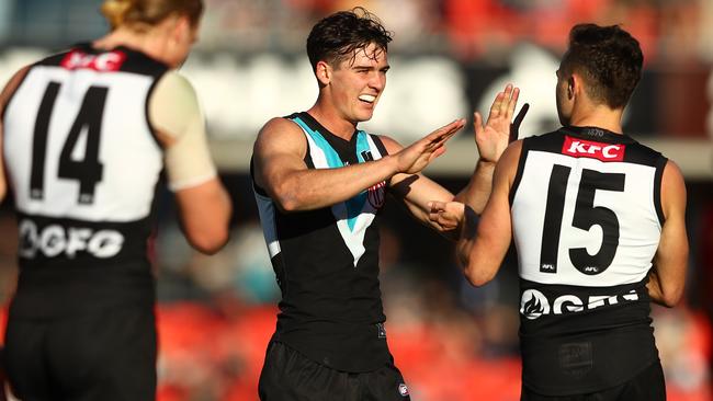 Connor Rozee celebrates a goal against the Suns. Picture: Chris Hyde/Getty Images