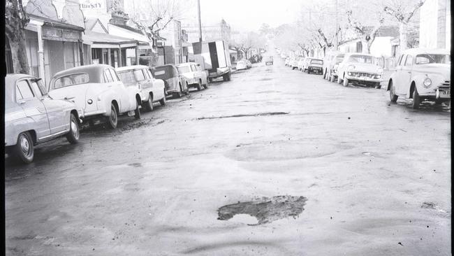 Potholes photographed in Rankins Rd, Kensington. Est 1960s. Picture: City of Melbourne