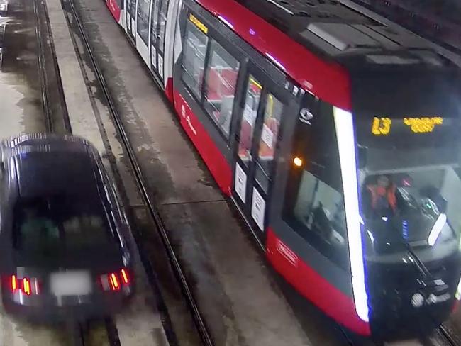 Screen grabs from video  supplied by Transport of Near misses involving trams., , Car in Moore park tunnel