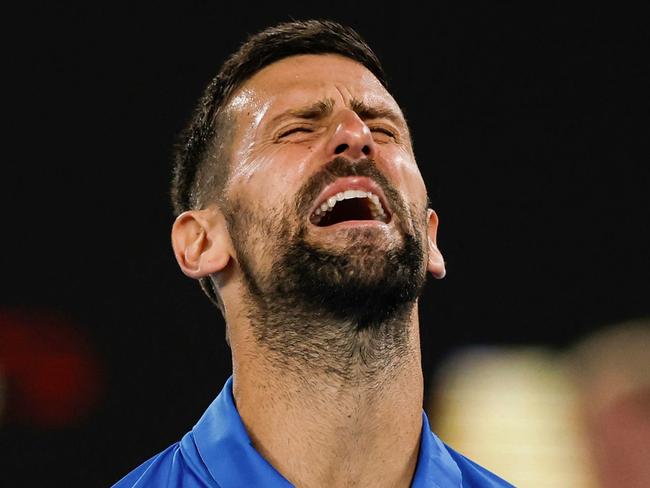 Serbia's Novak Djokovic celebrates victory against Czech Republic's Tomas Machac during their men's singles match on day six of the Australian Open tennis tournament in Melbourne on January 17, 2025. (Photo by Martin KEEP / AFP) / -- IMAGE RESTRICTED TO EDITORIAL USE - STRICTLY NO COMMERCIAL USE --