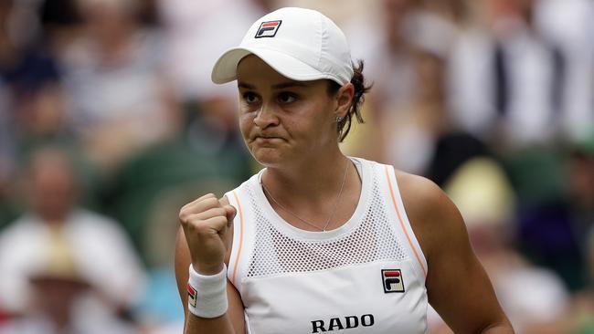 Australia’s Ashleigh Barty pumps her fist during her straight sets victory over Harriet Dart in Wimbledon’s third round. Picture: AP