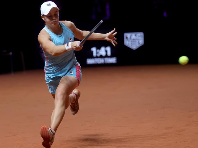 STUTTGART, GERMANY - APRIL 25: Ashleigh Barty of Australia returns a shot during the final match between Ashleigh Barty of Australia and Aryna Sabalenka of Belarus during day 9 of the Porsche Tennis Grand Prix at Porsche Arena on April 25, 2021 in Stuttgart, Germany. Sporting arenas around Germany remain under strict restrictions due to the Coronavirus Pandemic as Government social distancing laws prohibit fans inside venues resulting in games being played behind closed doors. (Photo by Alex Grimm/Getty Images)