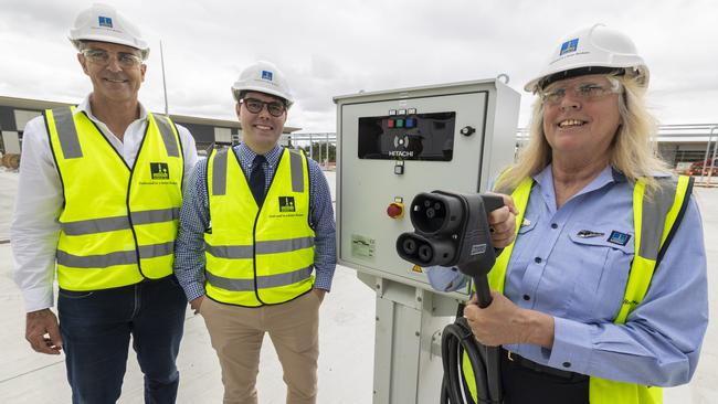 Brisbane City Council’s Major Projects General Manager Steve Hammer (left), Civic Cabinet Chair for Transport Cr Ryan Murphy (centre), and the first trained female Brisbane Metro driver Liesl Hales (right) at the new bus depot in Rochedale. Picture: Matthew Poon