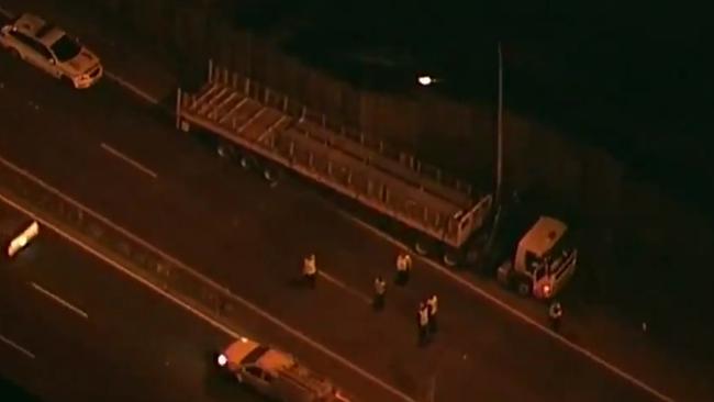 Emergency services attend to the accident before 5am on Tuesday. Picture: Channel 9/Twitter