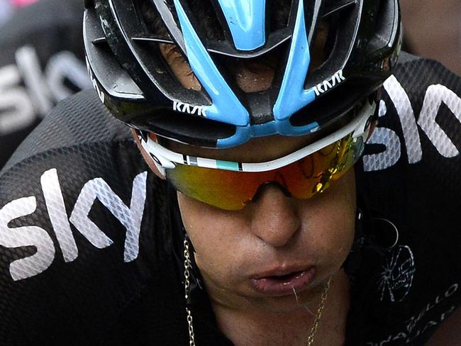 Australia's Richie Porte rides in the pack during the 161.50 km tenth stage of the 101st edition of the Tour de France cycling race on July 14, 2014 between Mulhouse and La Planche des Belles Filles ski resort, eastern France. AFP PHOTO / LIONEL BONAVENTURE