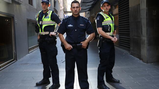 Inspector Craig Peel (centre) with officers Jeremy Bradley and Phil Inger from Melbourne East Police Station. Picture: Alex Coppel