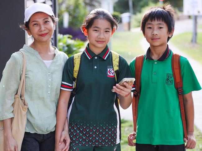 Anita Lou with children Wendy, 12, and Tim, 10, both students at Kelvin Grove State College. Picture: Nigel Hallett