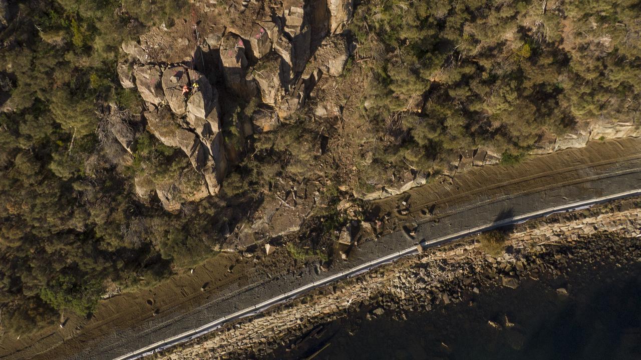 Removal of rock on the Tasman Highway near Orford. Picture ABC News Luke Bowden