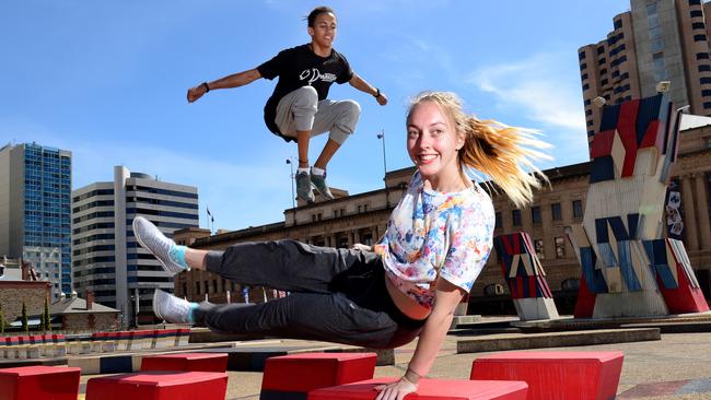 8/01/2016 Adelaide's Hajek Plaza the perfect place for Parkour enthusiasts Scott Stevens of Woodville and Felicity Boyd of the city. Pic Mark Brake