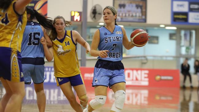 Sturt’s Jade Johnson, drives into the key ahead of Forestville’s Izzy Borlase during their Adelaide Basketball Challenge match. Picture: Dean Martin