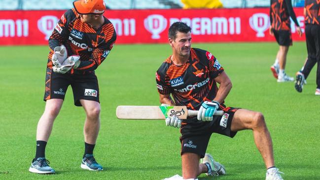 Simon Helmot (right) mid warm-up with 2024 IPL runners-up Sunrisers Hyderabad. Picture: Supplied.