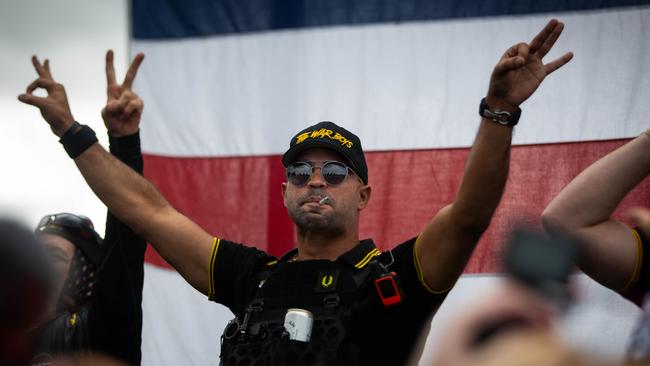 Proud Boy leader Enrique Tarrio makes the OK sign that is now seen as a symbol of white supremacy. Picture: AFP.