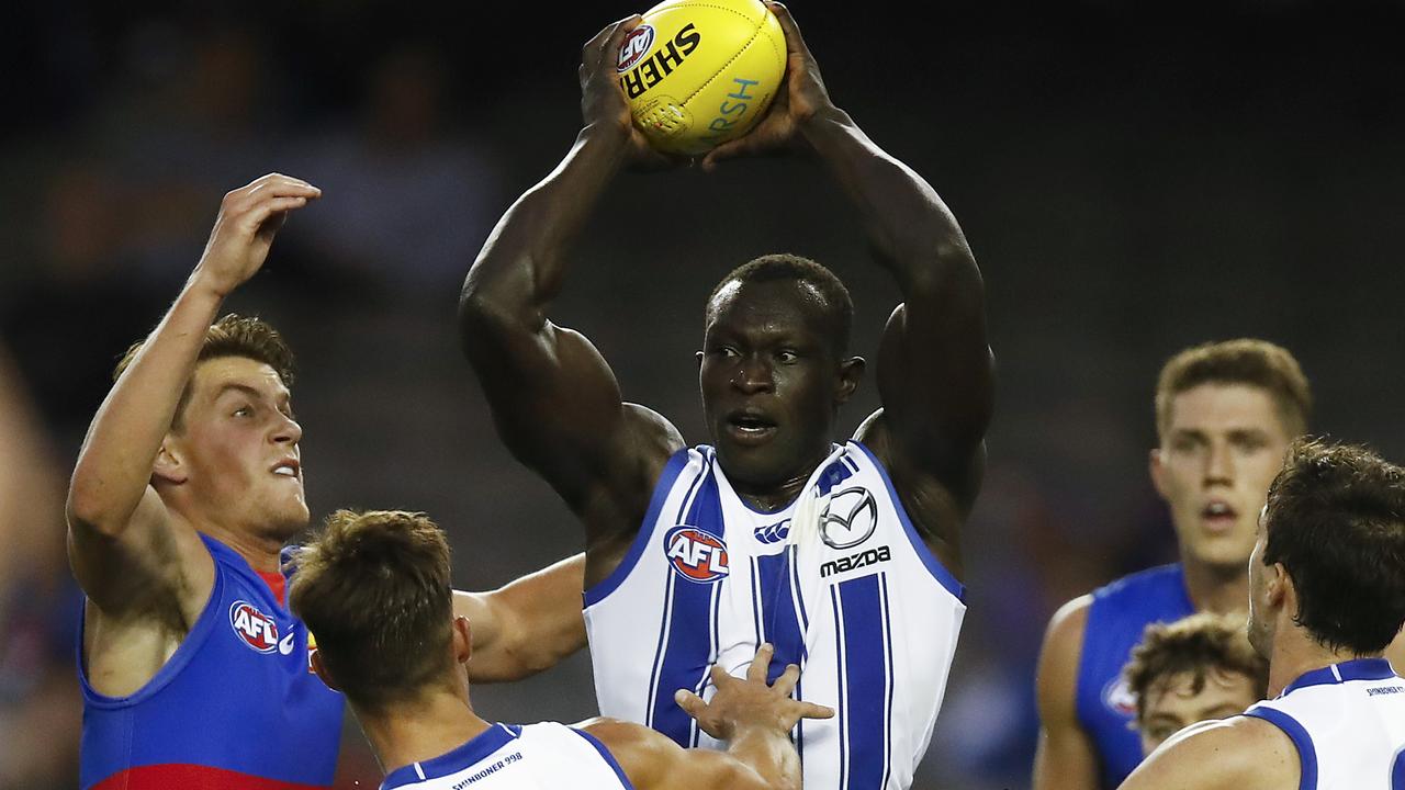 Majak Daw seizes possession during the Marsh Series against Western Bulldogs.