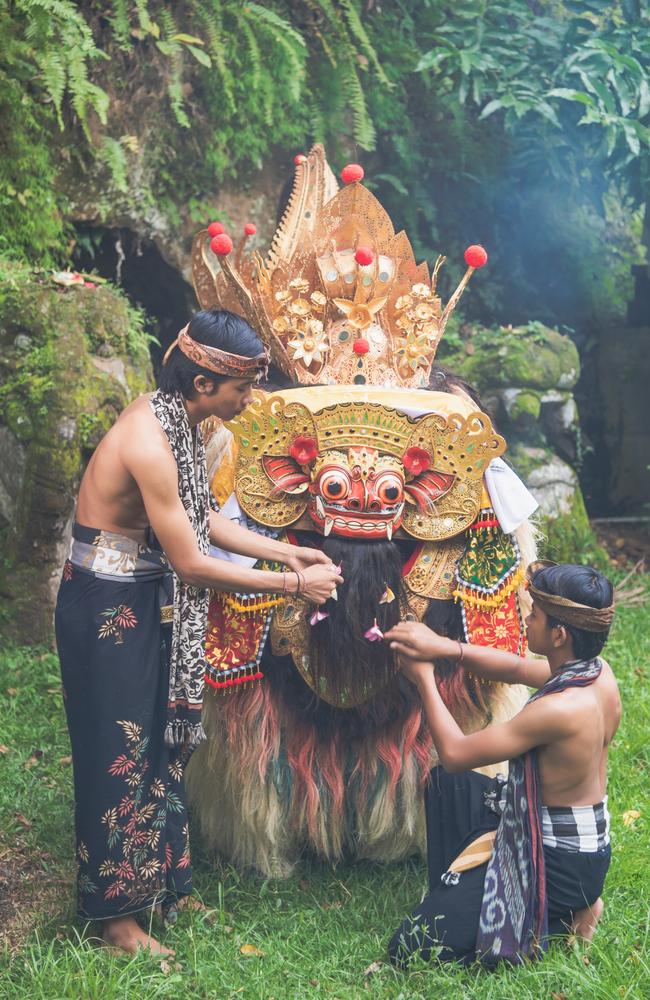 Bali island protective hindu spirit at ceremony Melasti and ritual temple dance before Balinese New Year. Photo: iStock