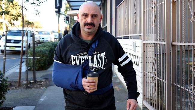 Khaled Merhi, outside his home in inner-Sydney Surry Hills on Tuesday, has been charged with possessing a prohibited weapon. Picture: Jane Dempster