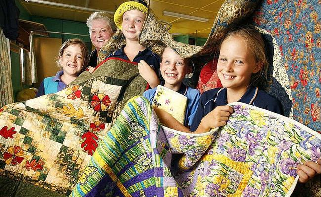 Preparing for the Boonah Girl Guides Quilt and Craft show from March 9-11 are (from left) Rhiannon Smith, district leader Beth Hern, Mikayla Schulz, Georgia Schulz and Emily Matthews. . Picture: Rob Williams