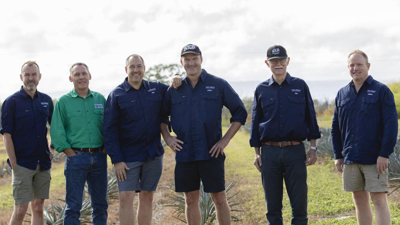 Top Shelf International communications executive Matthew Slade, Prospect Agriculture's Chris Monsour, master distiller Sebastian Reaburn, Top Shelf International co-founder and CEO Drew Fairchild, Kim Graves, and Top Shelf International general manager commercial and agave Michael Hennessy at Eden Lassie, the former eggplant farm on which one million agave plants will be grown and distilled into 