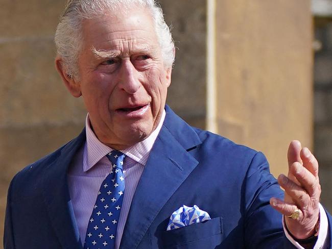 Britain's King Charles III (R) and Britain's Camilla, Queen Consort arrive for the Easter Mattins Service at St. George's Chapel, Windsor Castle on April 9, 2023. (Photo by Yui Mok / POOL / AFP)