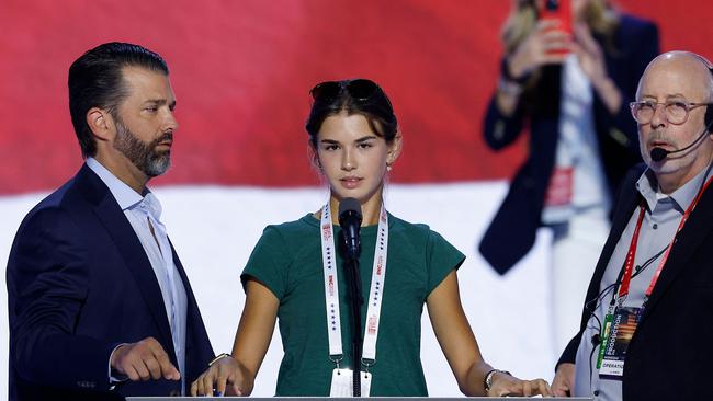 Kai Trump stands with her dad Donald Trump Jr., the son of Donald Trump, on stage on the third day of the Republican National Convention. Picture: AFP