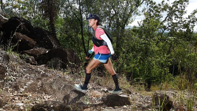 Cairns ultra long distance runner Julie Sager has set herself the goal of climbing up and down Walsh's Pyramid 20 times in row, scaling more than the equivalent height of two Mt Everests. Julie Sager sets off for her 13th ascent of the Pyramid south of Gordonvale. Picture: Brendan Radke