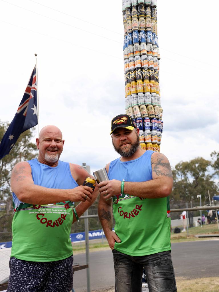 Adam Clark and Mark Meehan pose at can pole corner. Picture: NewsWire / Damian Shaw