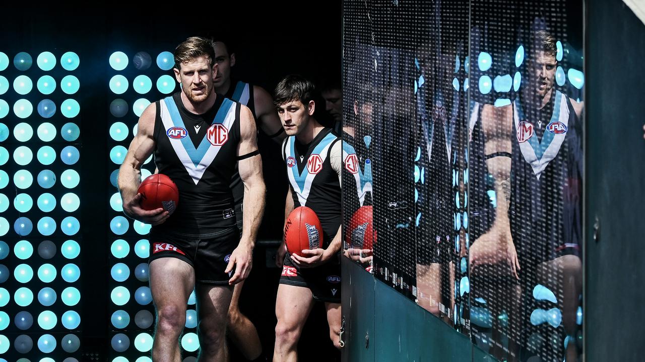 Tom Jonas leads the Power out for what may be his final game. Picture: Mark Brake/Getty Images