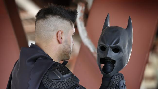 Taylor Tangas from South Morang has been outed as Melbourne's Batman and a villainous fraudster.