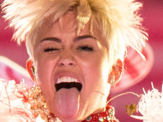 ANAHEIM, CA - FEBRUARY 20: (EDITORS NOTE: Retransmission of #470884327 with alternate crop.) Miley Cyrus performs onstage during her 'Bangerz' tour at Honda Center on February 20, 2014 in Anaheim, California. (Photo by Christopher Polk/Getty Images)