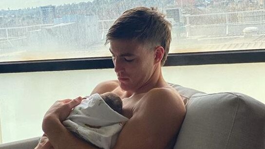 Jack Viney with new baby Mila in the hospital when she was just a few hours old. Picture: Instagram