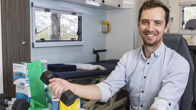 Better Movement Clinic director John Dennehy inside the mobile health clinic van the Toowoomba allied health provider is using to service rural areas, Tuesday, February 9, 2021. Picture: Kevin Farmer