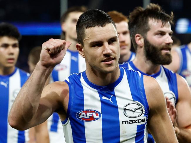 MELBOURNE, AUSTRALIA - JUNE 29: Luke Davies-Uniacke of the Kangaroos thanks the crowd after his 100th match during the 2024 AFL Round 16 match between the North Melbourne Kangaroos and the Western Bulldogs at Marvel Stadium on June 29, 2024 in Melbourne, Australia. (Photo by Michael Willson/AFL Photos via Getty Images)