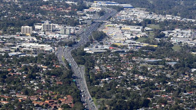 The M1 passes though Logan City from the air. Pic:Darren England.