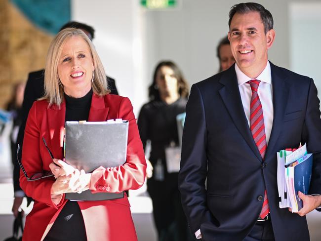 CANBERRA, AUSTRALIA - MAY 14: Australia's Treasurer Jim Chalmers (Front R) and Finance Minister Katy Gallagher (Front L) arrive for the budget lock-up at Parliament House on May 14, 2024 in Canberra, Australia. Australia's Labor government is grappling with a slowing economy, weaker commodity prices, soaring housing costs and a softening labor market as it prepares to unveil its federal budget on May 14. To counter these headwinds, the budget is expected to feature smaller revenue upgrades compared to recent years, while outlining the government's interventionist policies aimed at boosting domestic manufacturing and the transition to green energy. Critics warn that such industrial policies risk fueling inflation and diverting resources from more productive sectors of the economy. The budget is seen as a key opportunity for the Labor government to deliver broad economic support that analysts say is fundamental to re-election chances next year. (Photo by Tracey Nearmy/Getty Images)